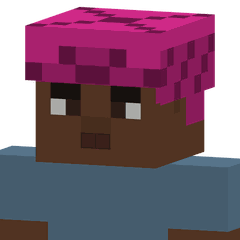 La cabeza de una figura de píxeles con un gele alto color magenta con pliegues.